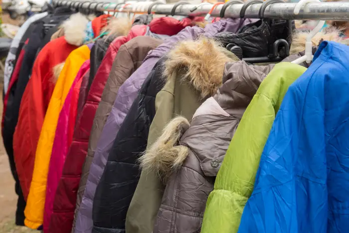 winter coats on a rack